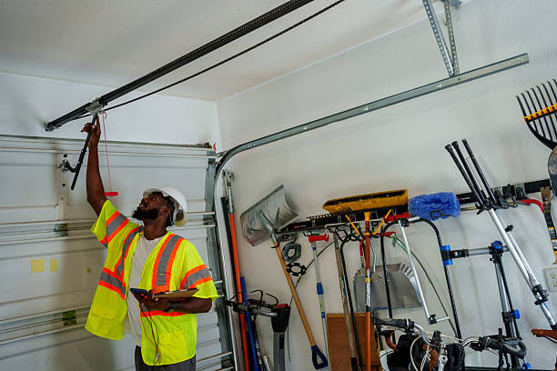 Professional Garage Door Panel Replacement technician working in Monroe County County, IA